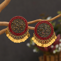Exaggerated retro round earrings with Bohemian hollow pieces, tassels, and Indian style earrings