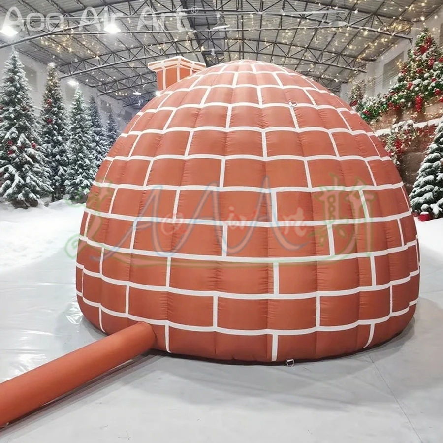 Beau igloo gonflable au mur de briques rouges avec cheminée, tente dôme gonflable d'hiver pour décoration extérieure de noël, Placement de cadeaux
