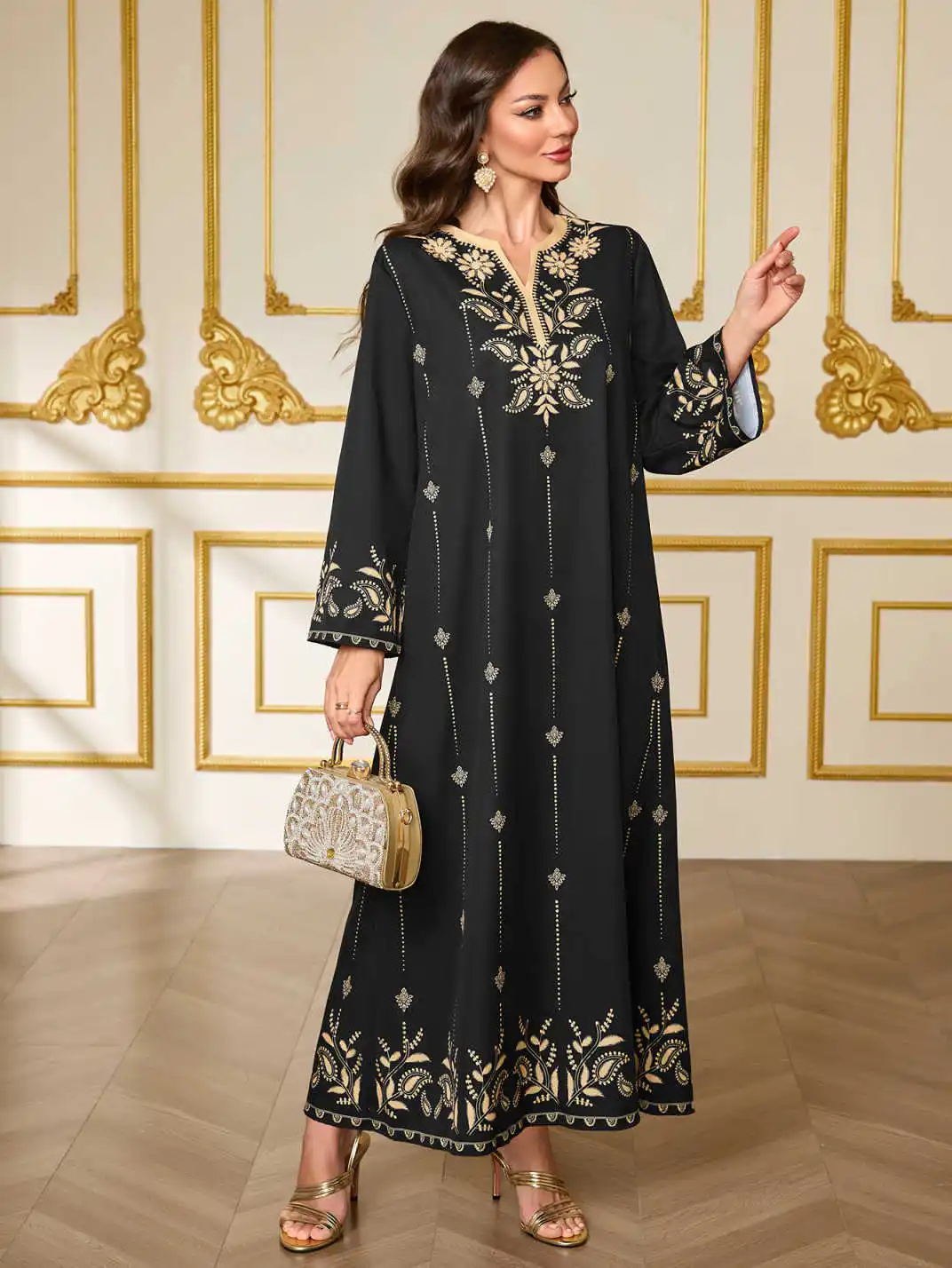 Islamische bestickte Abaya für muslimische Frauen mit Golddetails, ideal für formelle Anlässe im Nahen Osten wie UAE Saudi