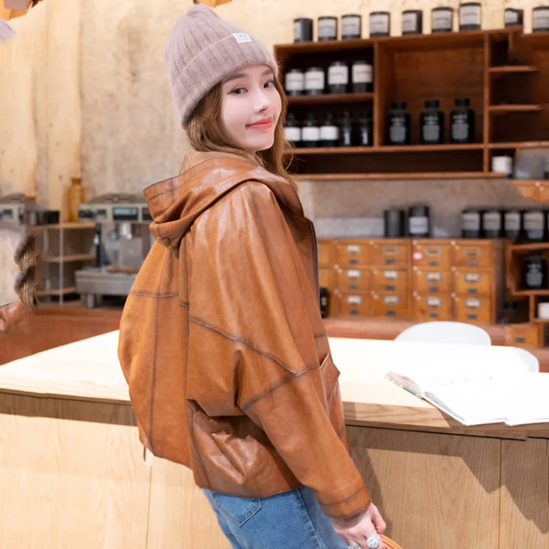 เสื้อหนัง Hooded Cape ผู้หญิงเกาหลี Casual หลวม Batwing แขนซิป Sheepskin ฤดูใบไม้ผลิของแท้หนัง Outerwear