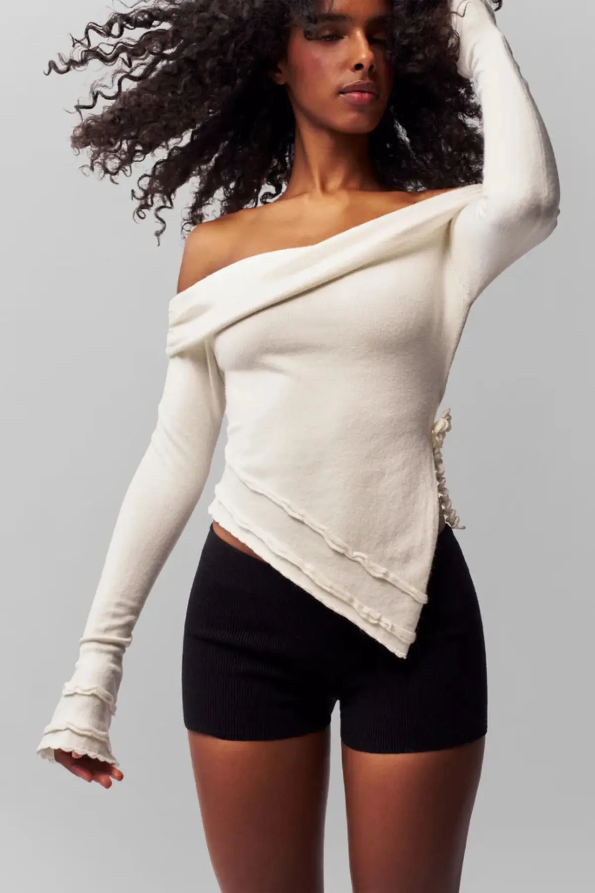 Guizi Autumn and Winter Folded Shoulder Knit Top Soft Elastic White Sweater Handmade Rose Decoration Design Irregular Hem Slit Sexy Autumn Sweater Fashionable Versatile Winter Wool Sweater