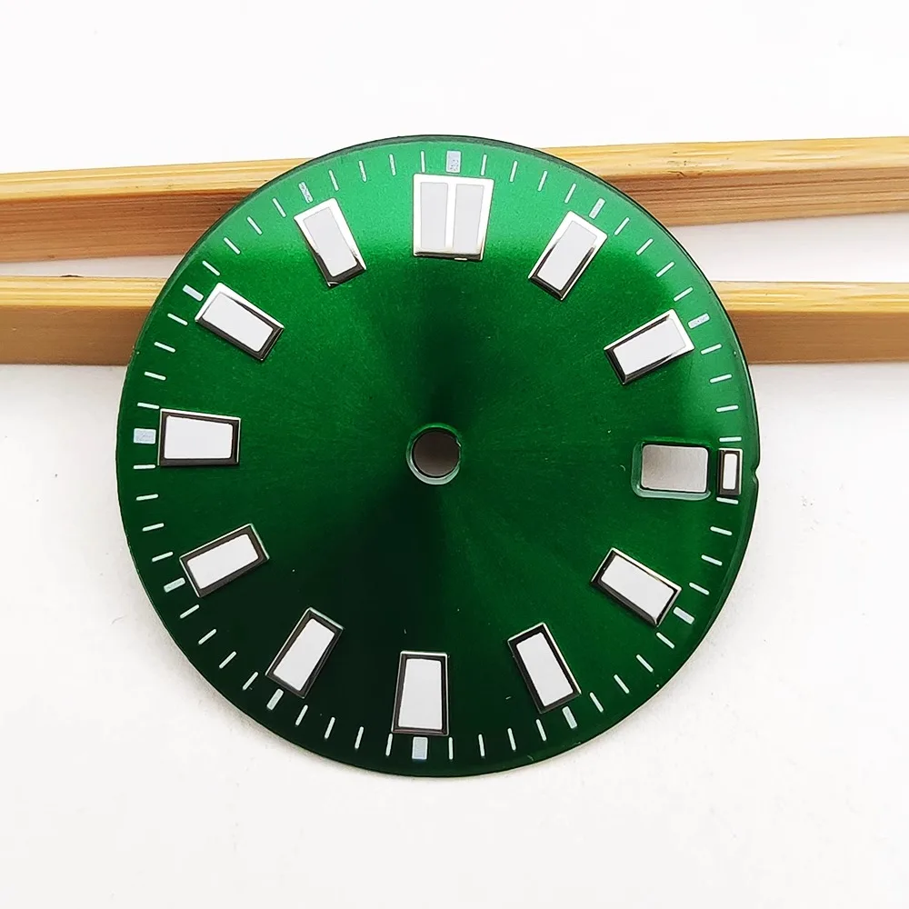 The 28.5 mm green dial watch features a sterile dial and a sun motif dial with NH35 movement