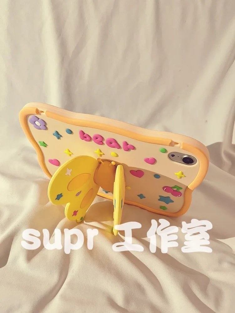 El soporte tridimensional de mariposa amarilla es adecuado para iPad de silicona.