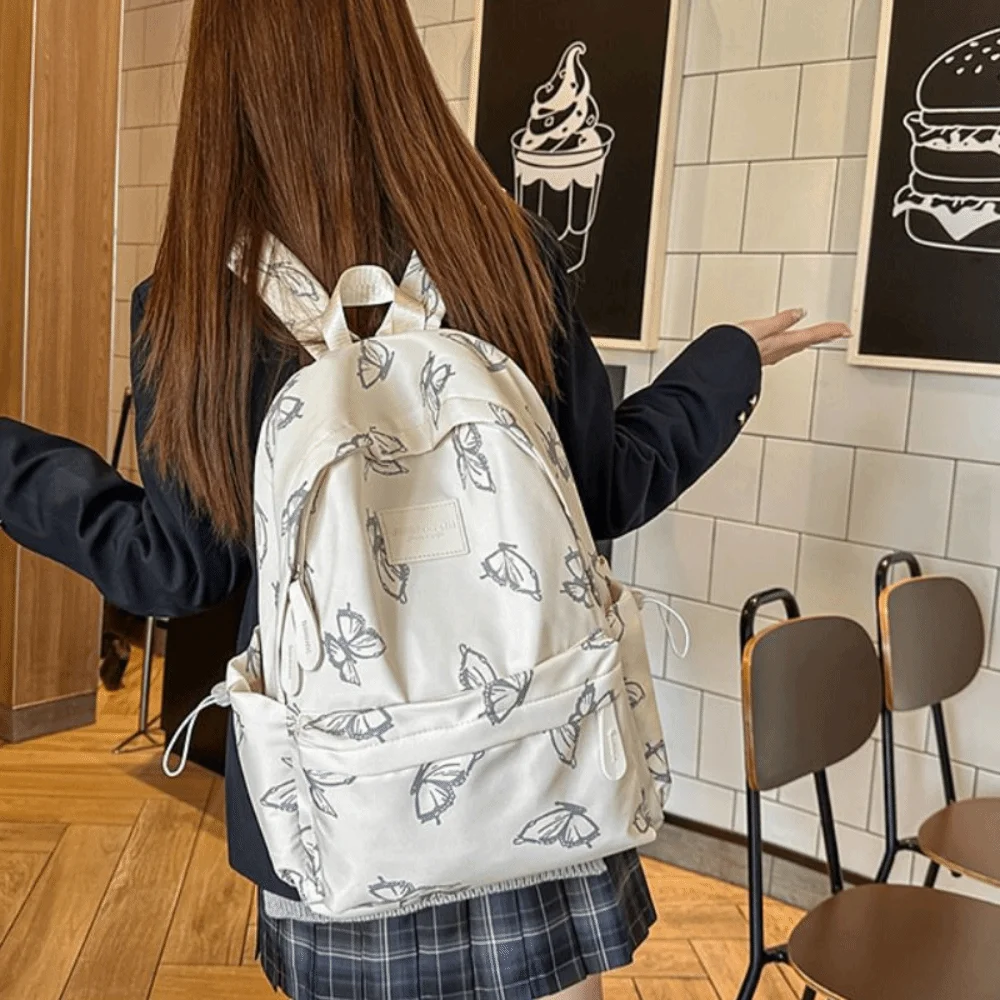 حقيبة ظهر بسيطة على شكل فراشة حقيبة يد على الطراز الكوري بسحاب حقيبة كتف بلون سادة حقيبة ظهر رياضية كاجوال للنساء