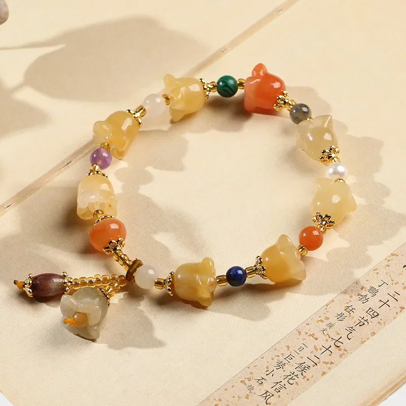 Natural gold silk jade bracelet women's girlfriend bracelet gold silk jade lily of the valley topaz bracelet hand jewelry