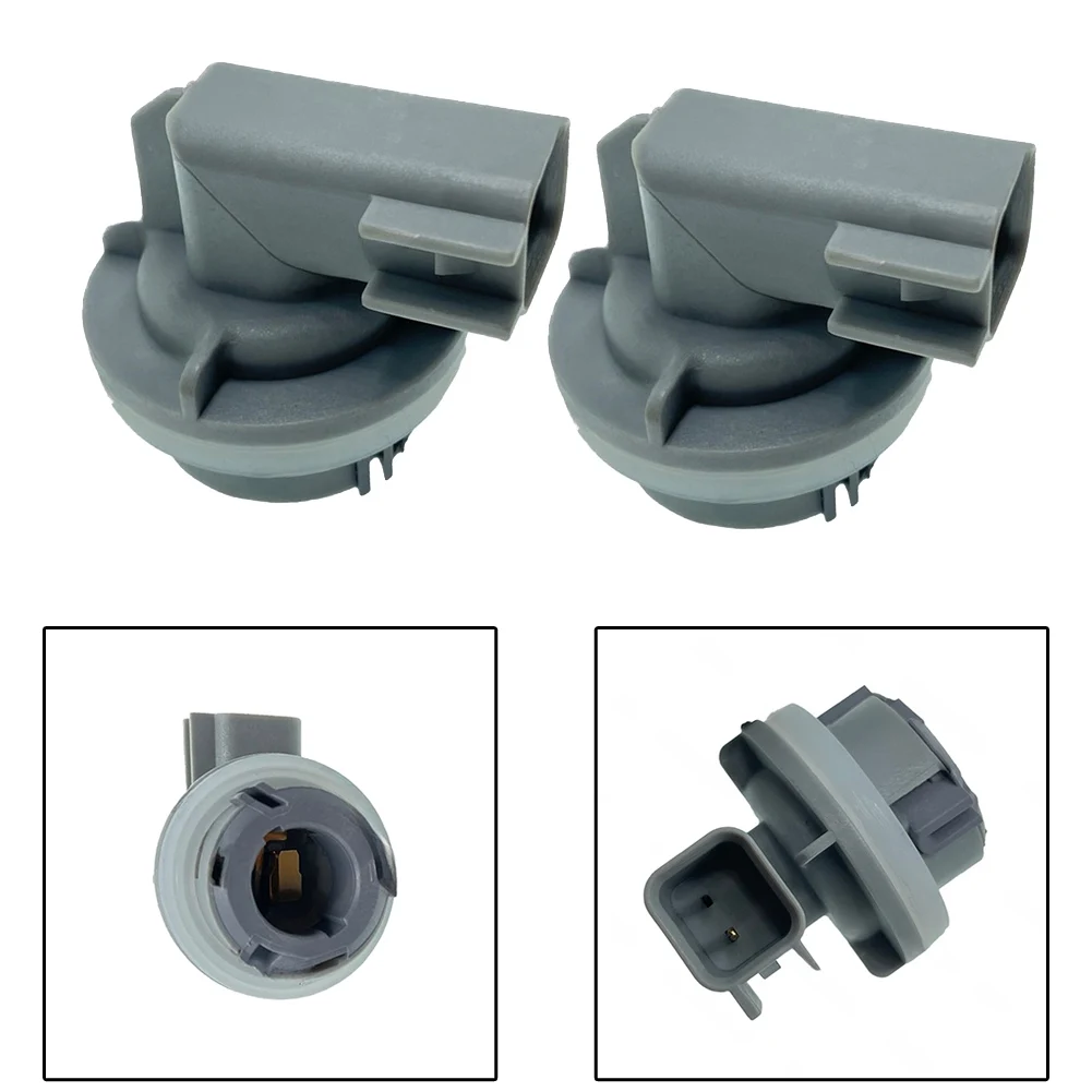 

Комплект из 2 держателей ламп заднего бампера для Land Rover Freelander 1 2004-2006 XFM500020, прямая замена, аналог OEM