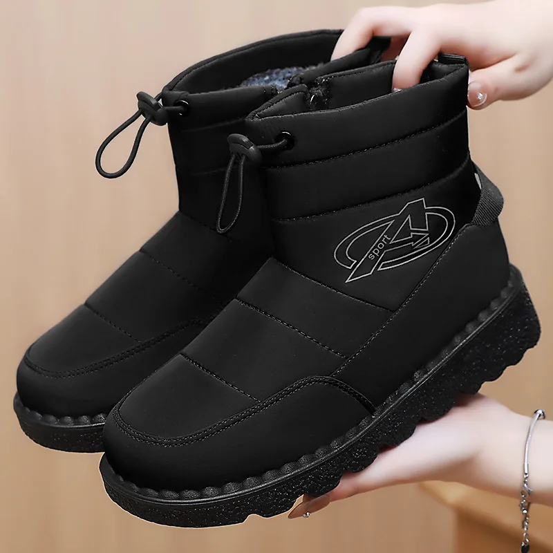 

Women's Winter Thick Bottomed Fleece Lined Slip on Cotton Boots Waterproof Anti Slip Warm Shoes round Toe Synthetic Surface