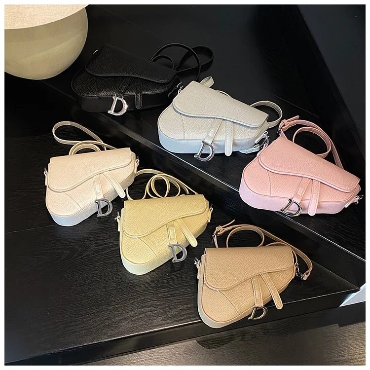 Venda quente nova bolsa de sela de luxo-design retrô e de nicho, estética sofisticada, bolsa crossbody/ombro moderna para mulheres,