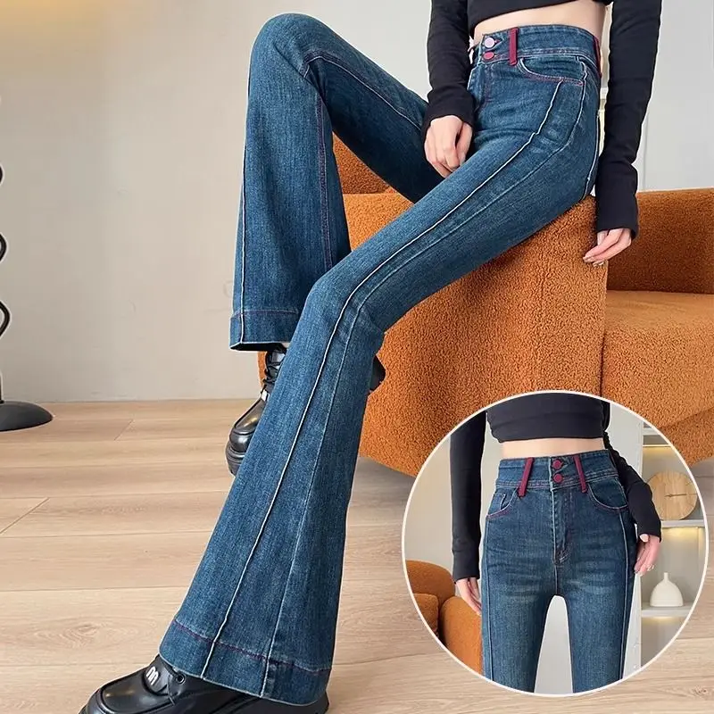 Americano retro cor contrastante micro-flare jeans feminino 2025 primavera e outono nova barriga-aperto nádegas emenda