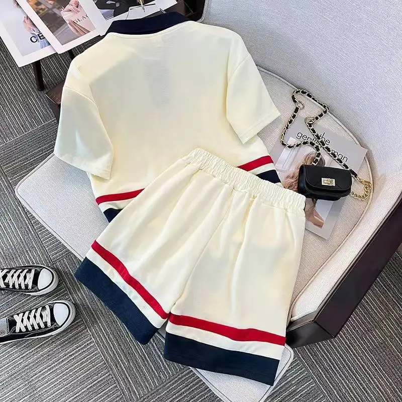Estate bambini ragazzo vestiti Set bambino risvolto t-shirt e pantaloncini 2 pezzi abiti ragazze adolescenti moda lettera stampa Top Bottom tuta