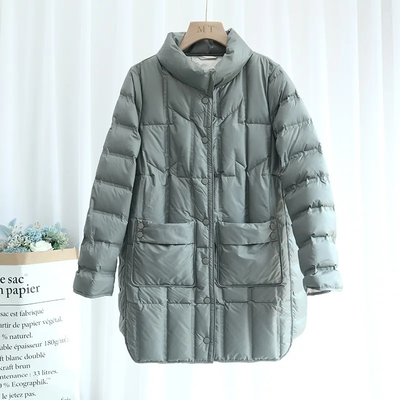 Doudoune mi-longue à col montant pour femme, vêtement d'extérieur léger, avec ourlet à la mode, duvet de canard blanc, de luxe, nouvelle collection automne hiver
