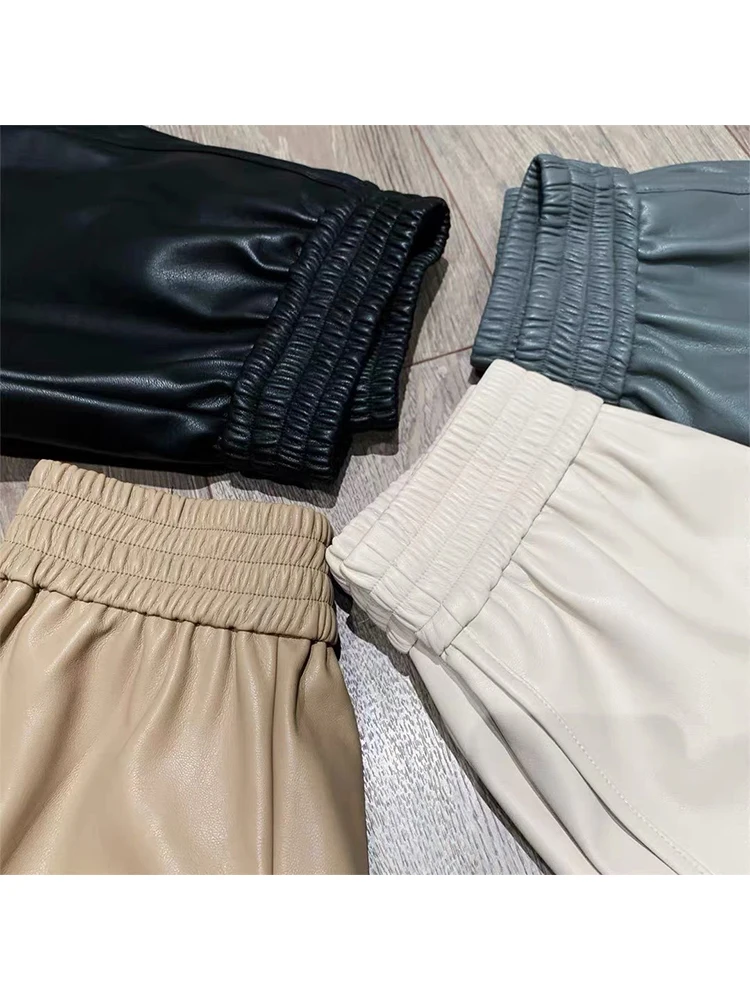 

Женские кожаные брюки А-силуэта с высокой талией, широкие штанины, повседневные, однотонные, с эластичным поясом, из овчины, черные, кожаные.