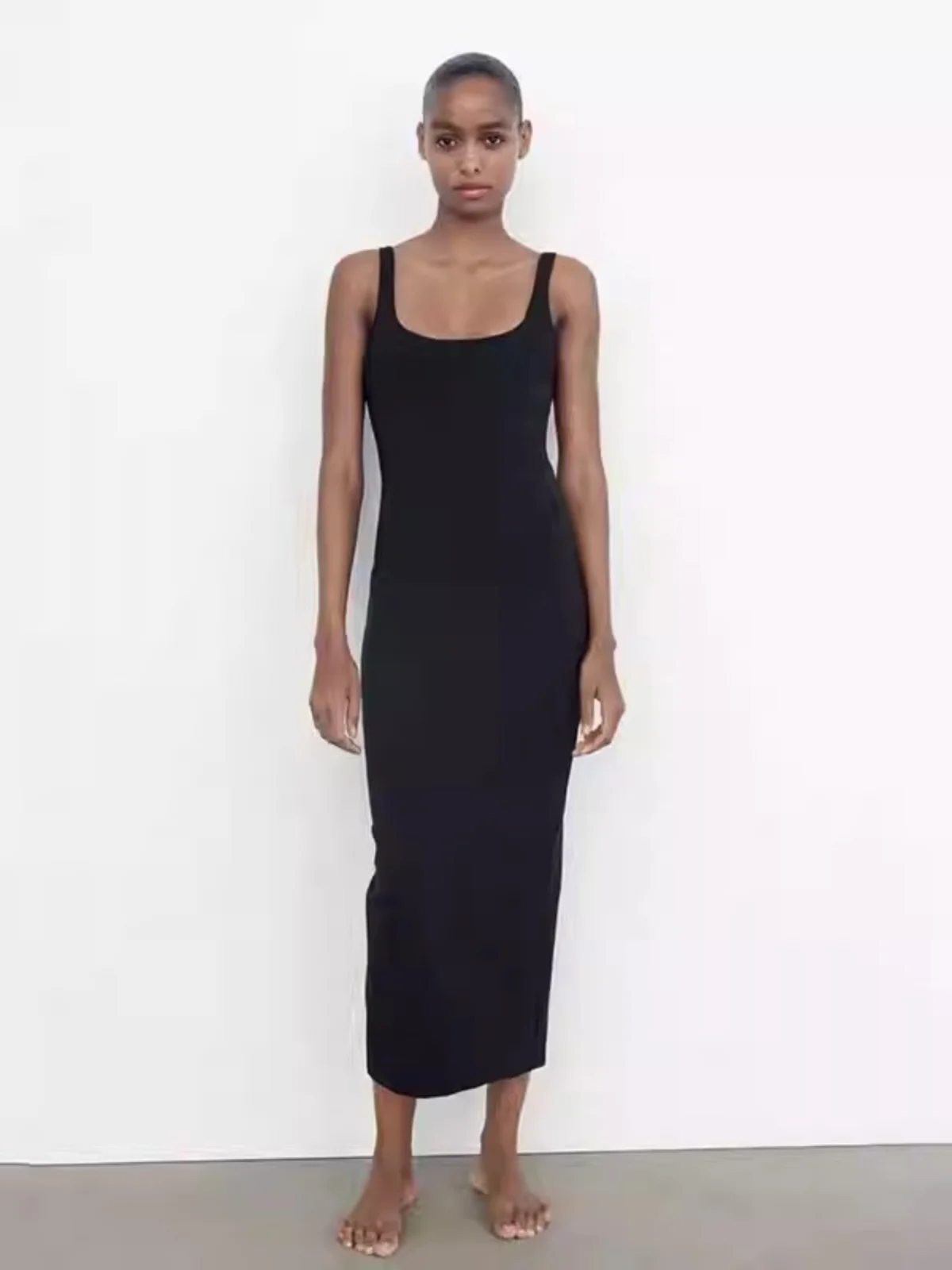 فستان نسائي أنيق جديد لموسم الربيع بكتف مكشوف وقطعة واحدة بتصميم عصري مع شق وقصة ضيقة وياقة على شكل حرف U بدون أكمام من مواد ...