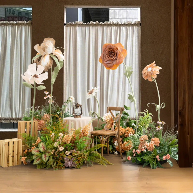 Photo floral scene arrangement large paper flower green plant landscaping Internet celebrity clock in the background