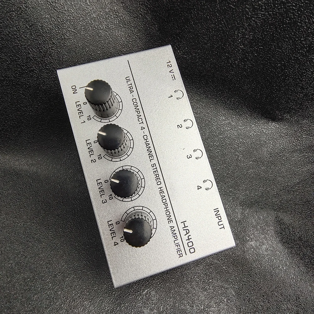 

Top Deals 4 Channels Mini Stereo Headphone Amplifier HA400 Ultra-Compact Audio Amplifier With Power Adapter EU US Plug Adapter