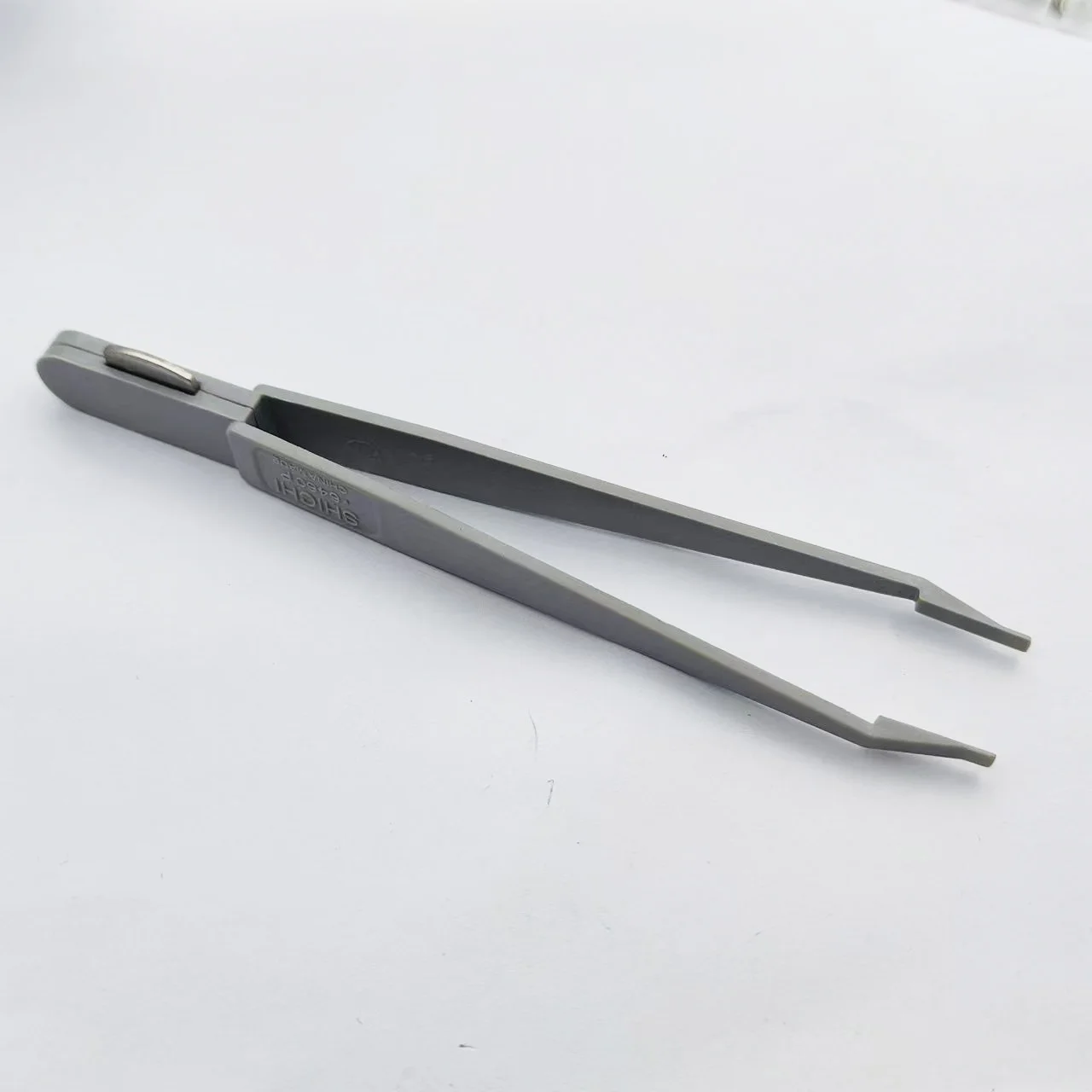

Dual purpose tweezers for repairing watches, opening back covers, and replacing batteries