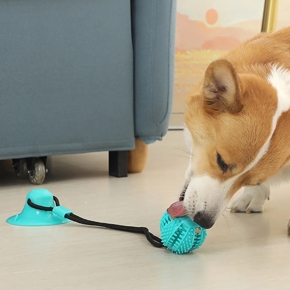 

Interactive Suction Cup Dog Toy with Sound and Treat Dispensing - Durable Rubber Ball for Training and Tug-of-War Fun