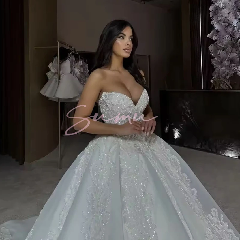 فستان رائع لحفلات الزفاف فستان الزفاف مطرز على شكل حرف v بدون أكمام تنورة منتفخة أماندا نوفيا 2025 فيستدوس دي نوفيا