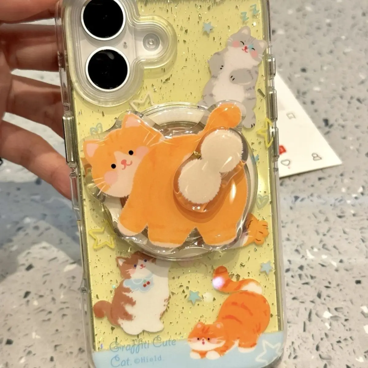 INS風のかわいい漫画風ジンジャーキャットマグネットホルダー グリップトック スマホスタンド iPhone 16 15 14対応 指リングホルダー