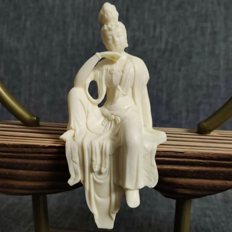 

Ivory Nut Half Sitting Small Free Guanyin Buddha Ornament Home Living Room and Tea Room Study Antique Shelf Decorations