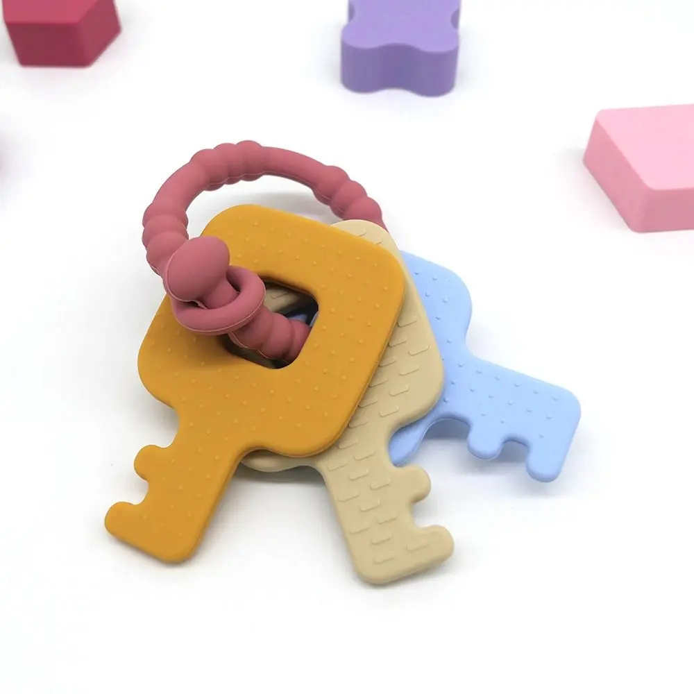 New Silicone Key Chain and Sensory Teether Interactive Washable Bed Bell Montessori Pain Relief Teething Newborn
