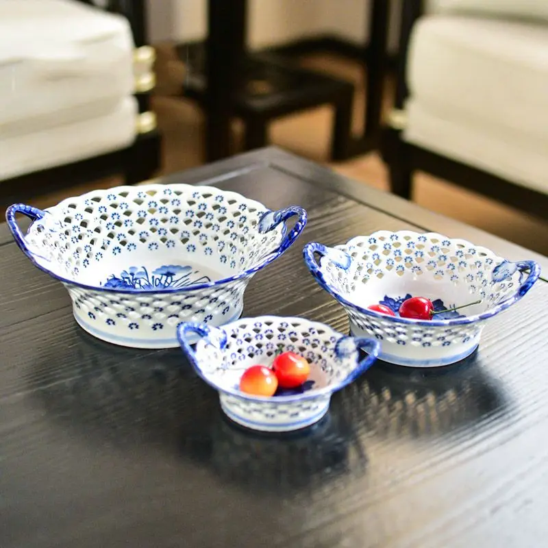 

Ceramic three-piece hollowed-out carved fruit bowl flower basket hand-painted blue and white ornaments storage