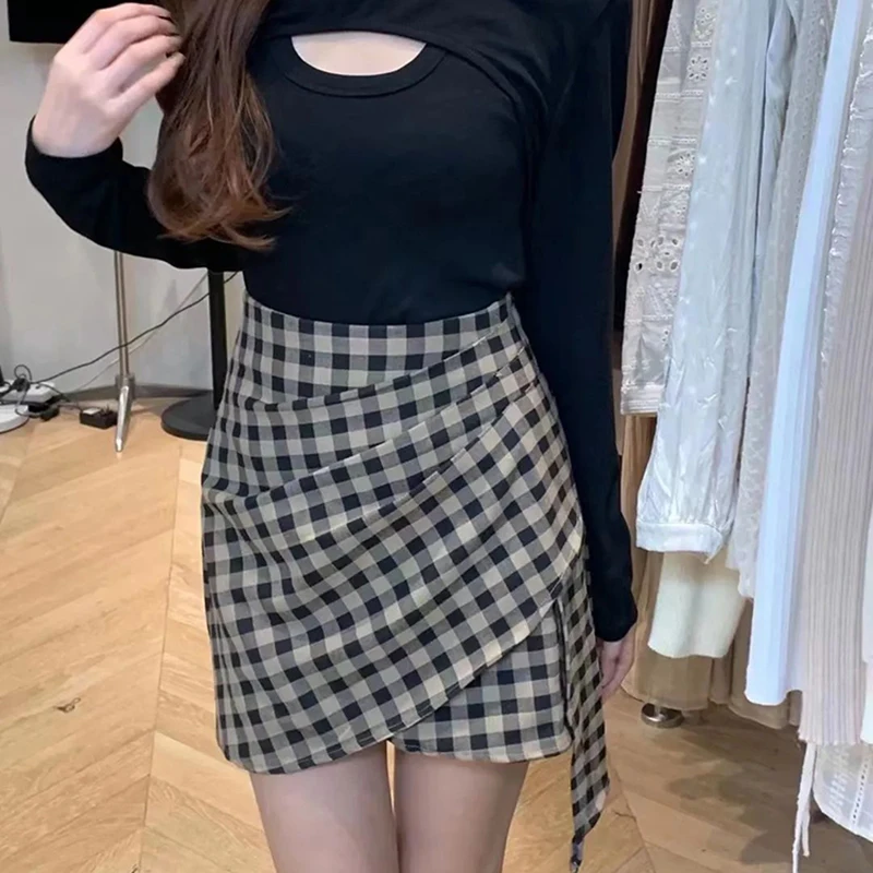 

Irregular black-and-white plaid skirt New high waist slim bag hip skirt pleated design sense A-shaped skirt in summer