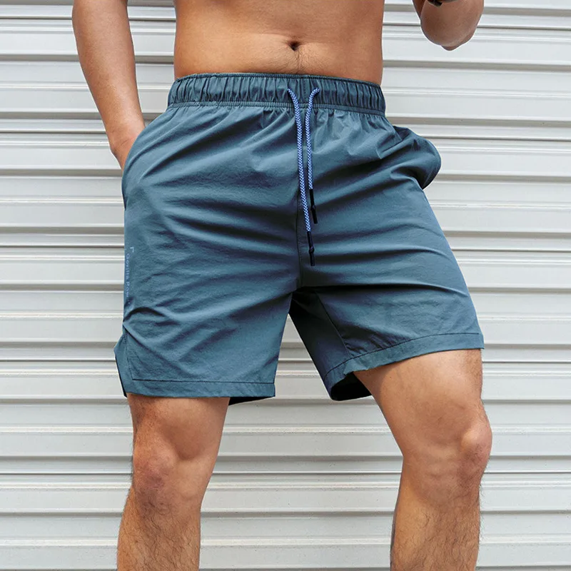

New sports quick-drying shorts for men casual fitness exercise running five-point pants large size water absorption sweating