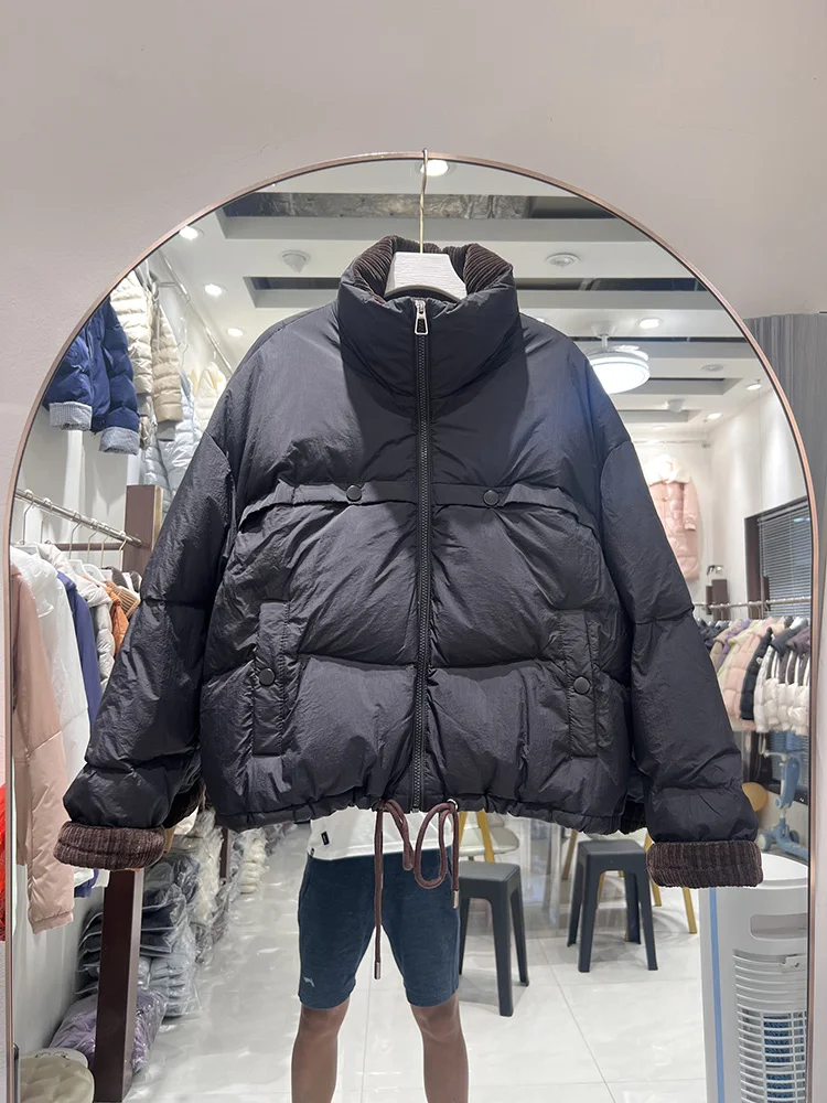 Corduroy splicing stand up collar down jacket for women in 2025 new short style fashionable button white duck down jacket