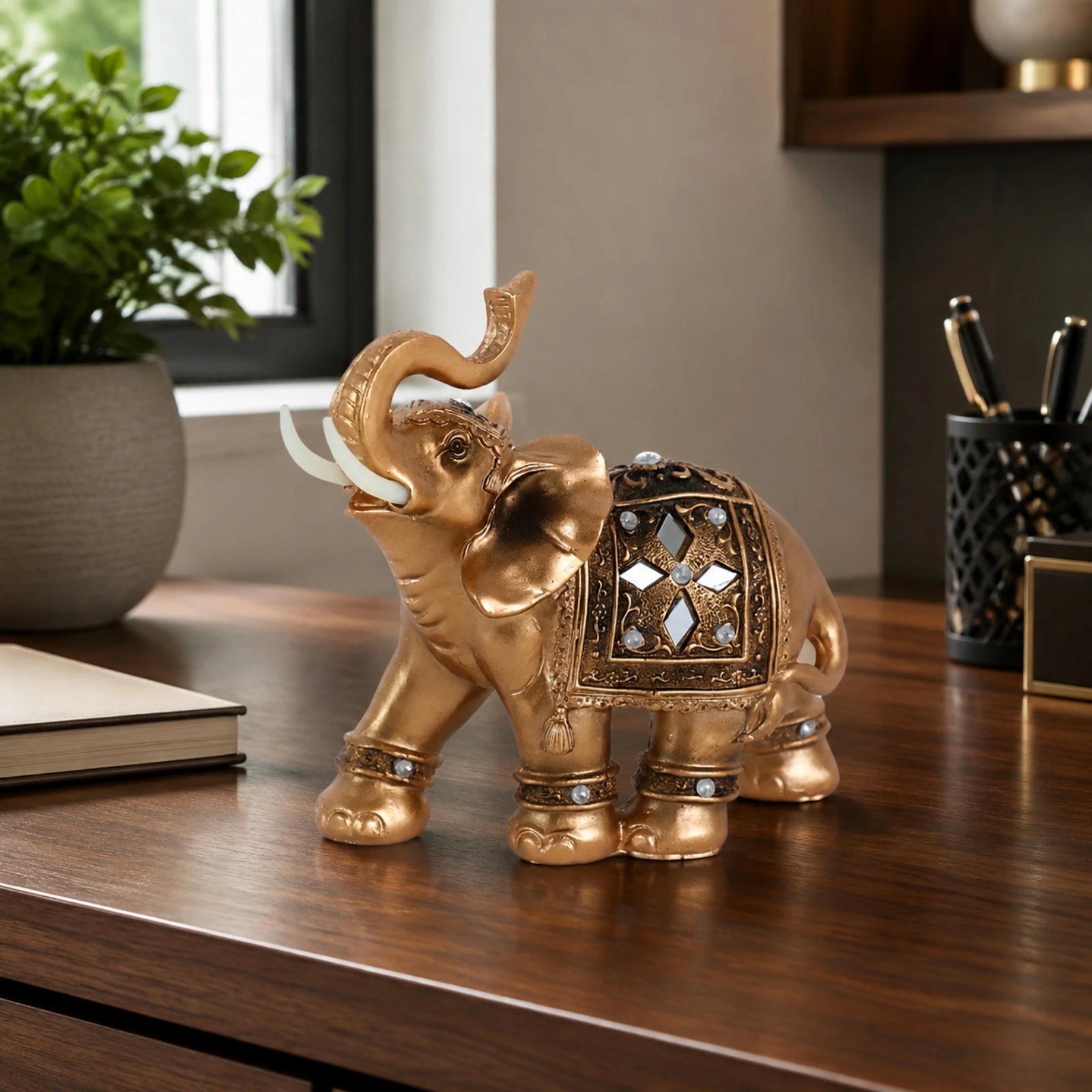 Ornate Elephant Figurine with Decorative Saddle Auspicious Gold-Toned Elephant Decor with Raised Trunk Compact Long-Lasting