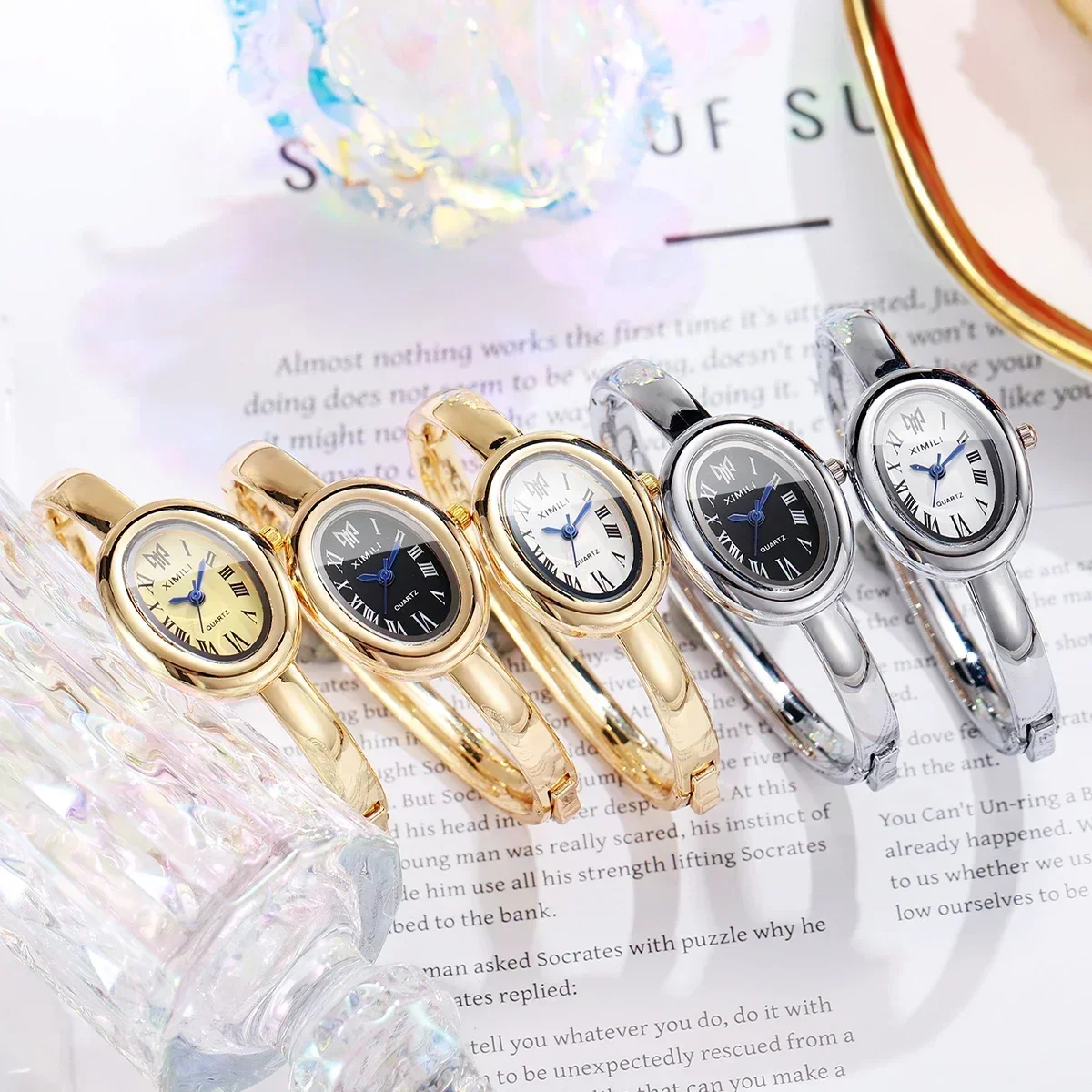 Women Vintage Oval Open Bangle Watch Gold Tone Roman Numeral Dial Blue Hands Quartz Wrist Watch No Box