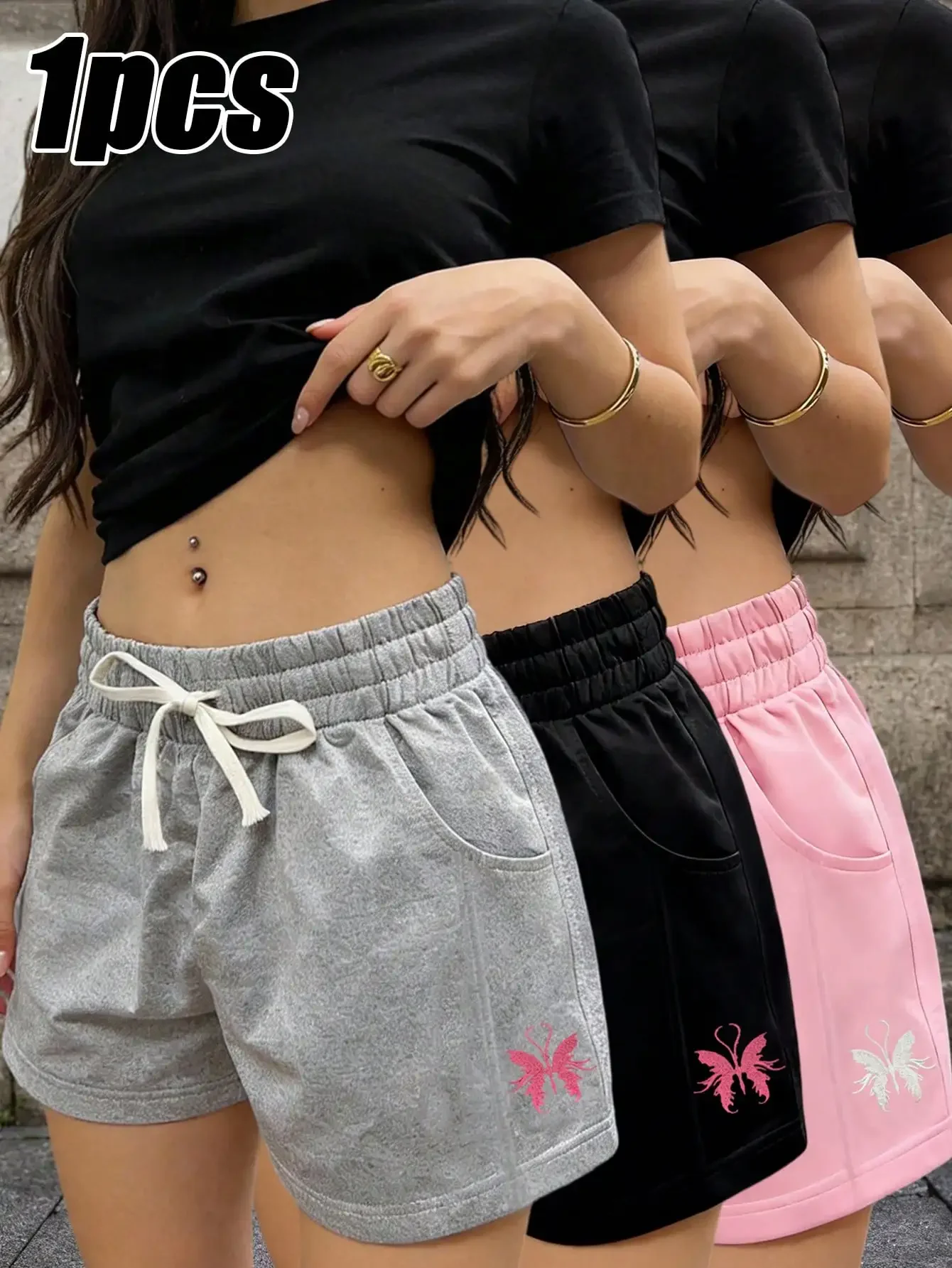 

This Women's Casual Shorts Feature An Elastic High Waist With Drawstring, Slimming Design. The Side Features A Pink Butterfly Embroidery, Suitable For Daily Wear, Fitness, Running, And Outdoor Activities. Sports