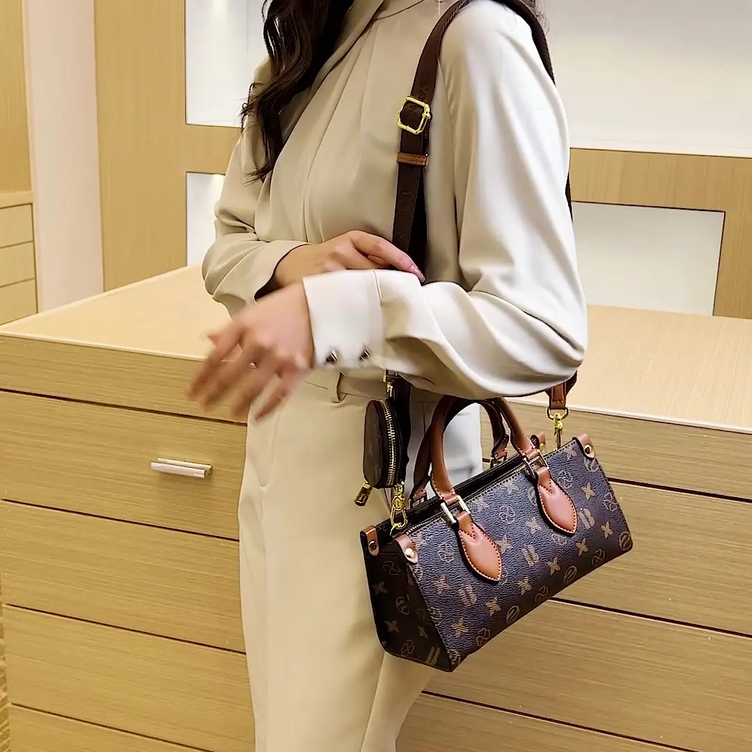 2024 The new women's handbag light luxury temperament fashion with old age bag wide shoulder crossbody bag M015