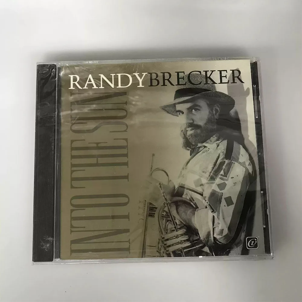 

CD This Is The Fusion Jazz Studio Album 'Into The Sun' By American Legendary Trumpeter and Grammy Award Winner Randy Brecker.