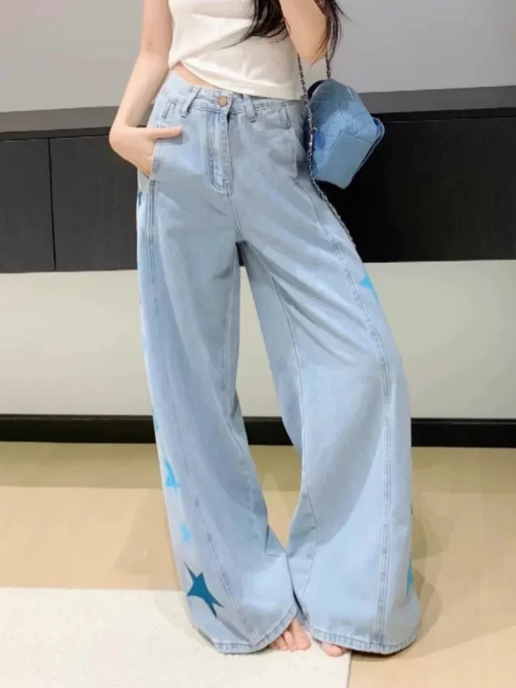 กางเกงยีนส์ผู้หญิงทรงแบ็กกี้สีน้ำเงินฟอกลายดาวสไตล์ Y2K ปี 2025 เสื้อผ้าผู้หญิงลำลองผ้าฝ้ายเดนิม