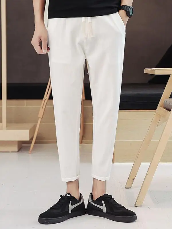 กางเกงขายาวผู้ชายผ้าฝ้ายลินินบางเบาใส่สบายทรงหลวมเอวต่ำสไตล์วัยรุ่น รุ่น Harlan 9 ชิ้น ทรงขาเรียวเล็ก