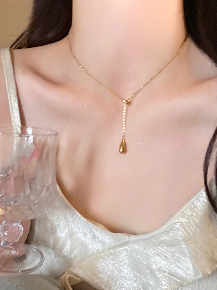 

Tassel gold droplet necklace