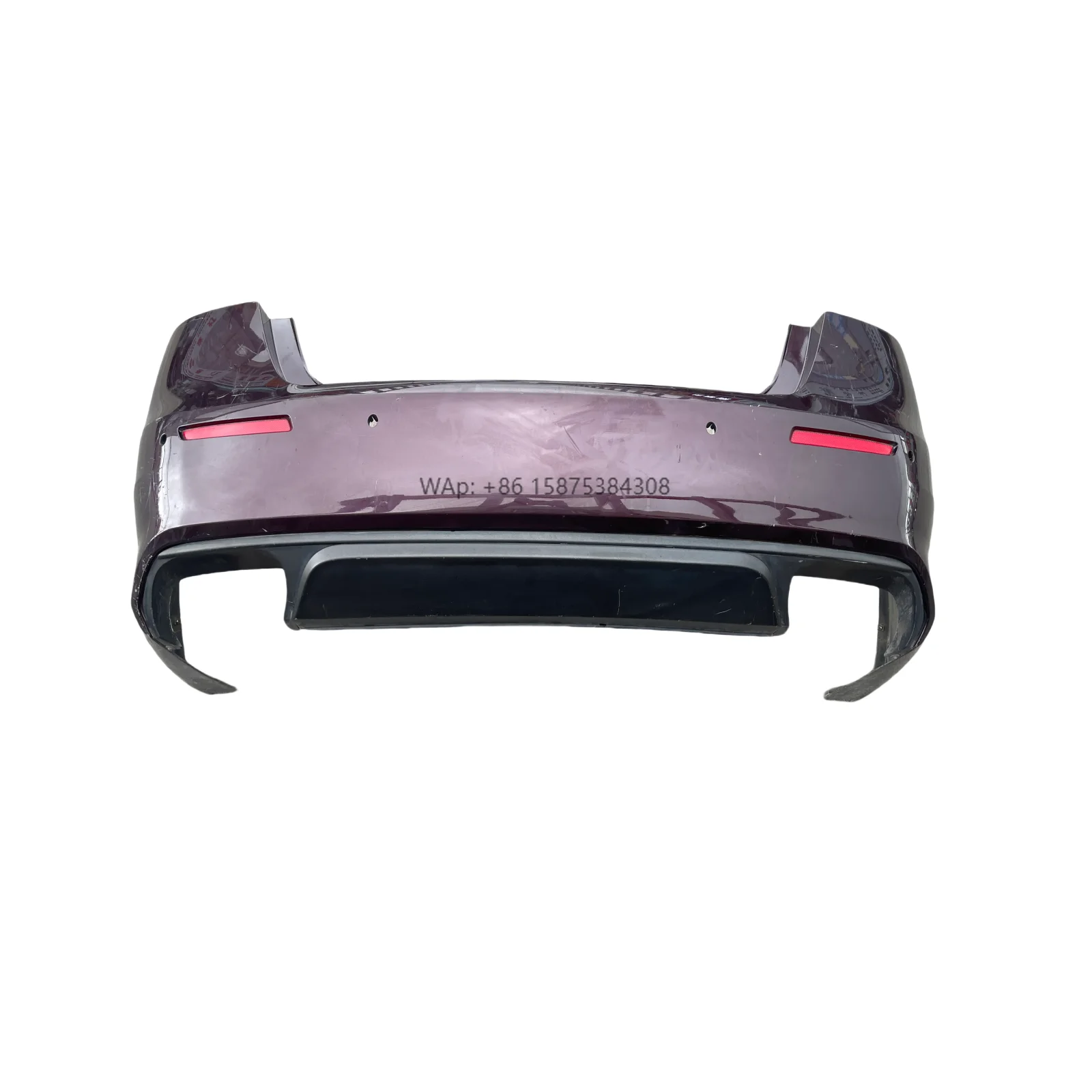 

The Classic High Quality Quattroporte M156 President Rear Bumper Surrounds the Lower Lip of the Spoiler