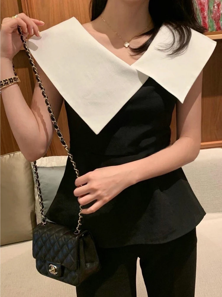 エレ・ヘップバーン スリムトップ ヴィンテージ 大きめ襟 スリムフィット ウエストシェイプ おしゃれな服