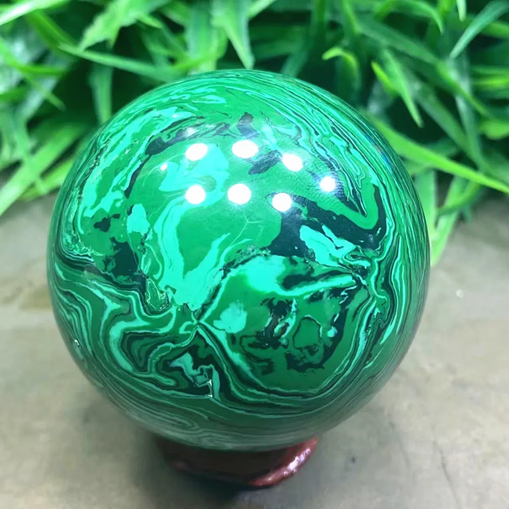 Handmade energy balls, malachite, quartz crystal balls and polished healing balls for home decoration
