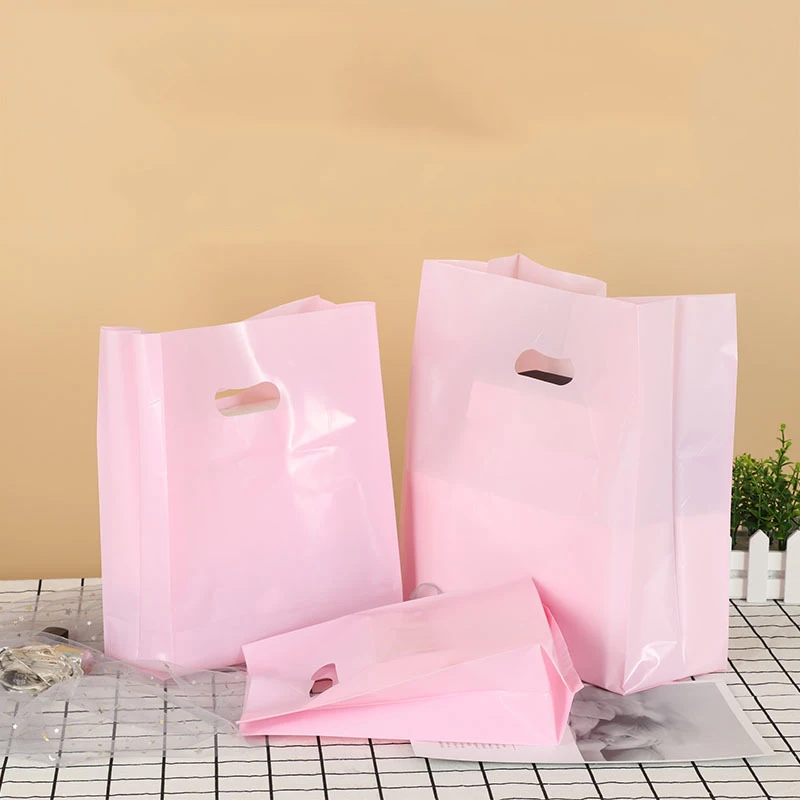 50Pcs/Lot Solid Pink Color Gift Bags with Handles 4 Sizes Plastic Party Favor Bags High Quality Shopping Bags for Clothes Store