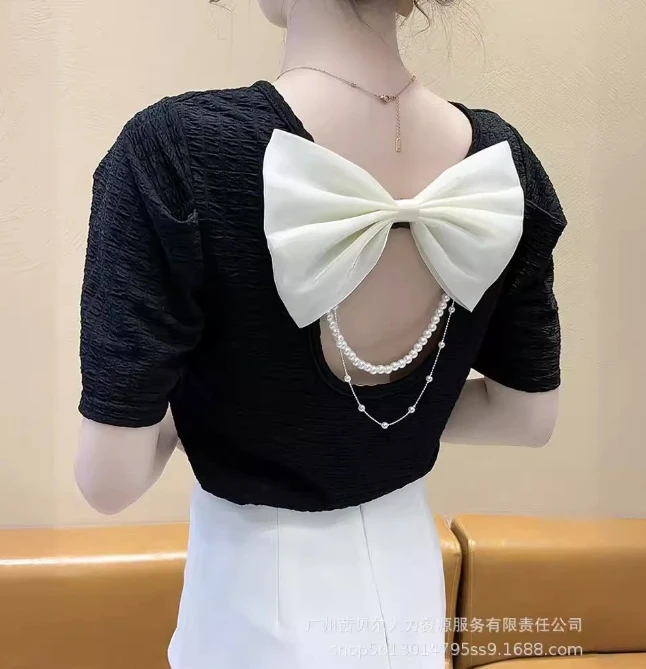 Summer round neck women's bubble sleeves sweet butterfly condensation back short sleeved top elegant commuting style pearl chain