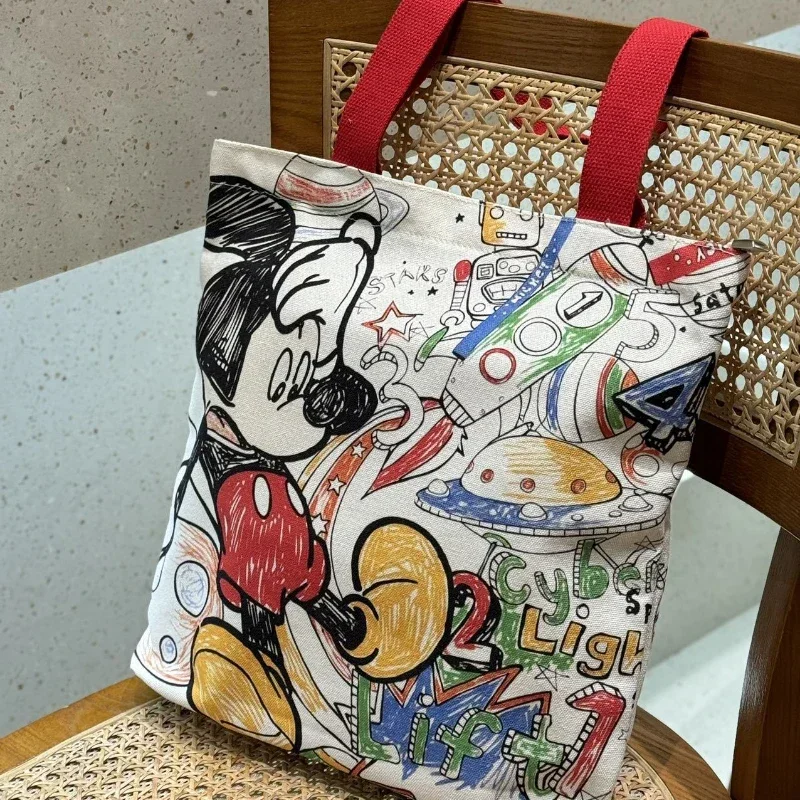 

2025 New Disney Mickey Mouse Graffiti Canvas Bag Double-sided Art Painting One-Shoulder Handbag Student Class Tote Bag