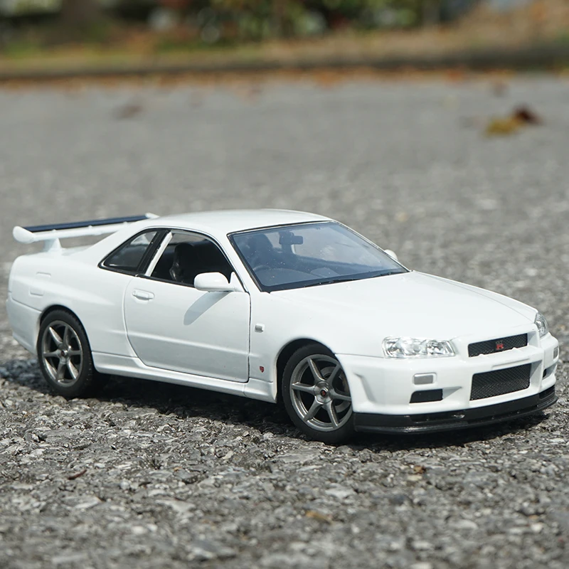 Welly-Nissan Skyline GTR R34, coche deportivo de aleación, modelo de simulación de coche de carreras de Metal fundido a presión, colección de