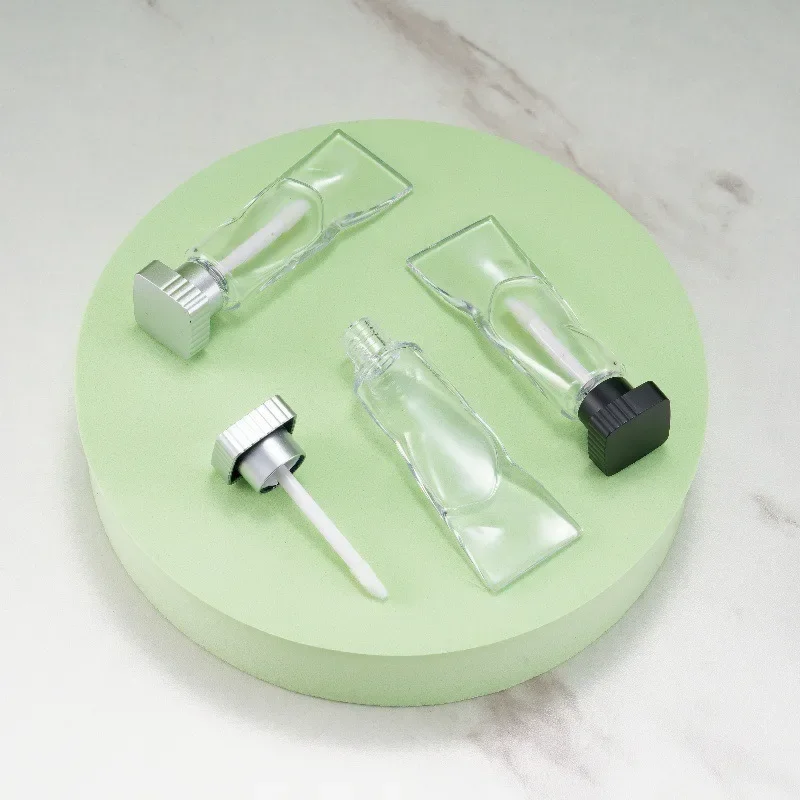 50 قطعة من البلاستيك الفريد القابل لإعادة الملء الأسود آيس كيوب أحمر الشفاه التعبئة والتغليف معجون الأسنان شكل أنابيب حاوية ملمع الشفاه مع قضيب 4 مللي