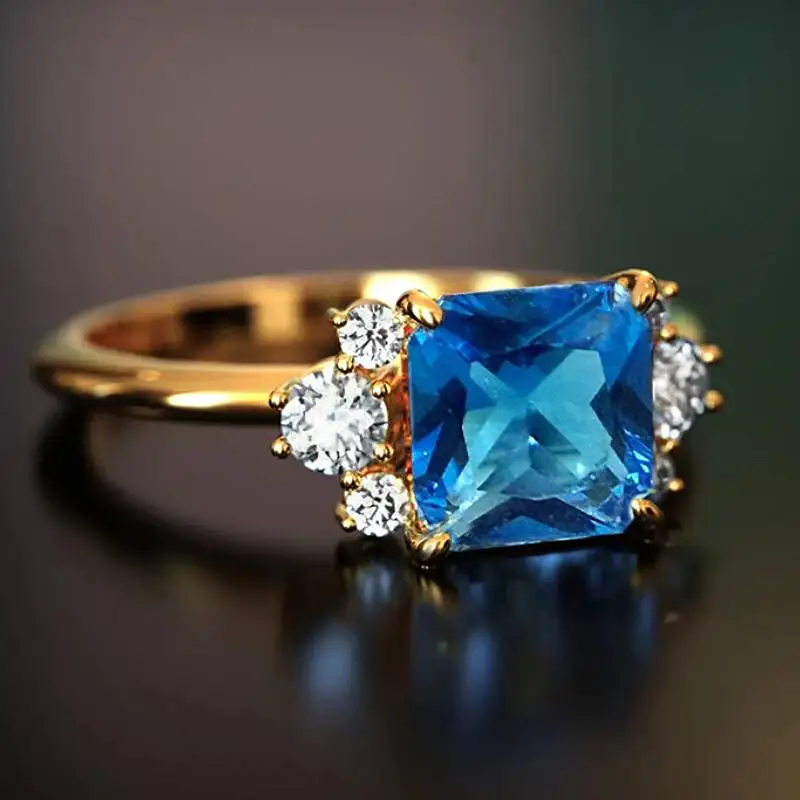 Anel Feminino Huitan Charmoso com Zircônia Cúbica Azul Quadrada Brilhante, Acessório de Moda para Festas, Joia Elegante para Casamentos e Uso Diário Feminino