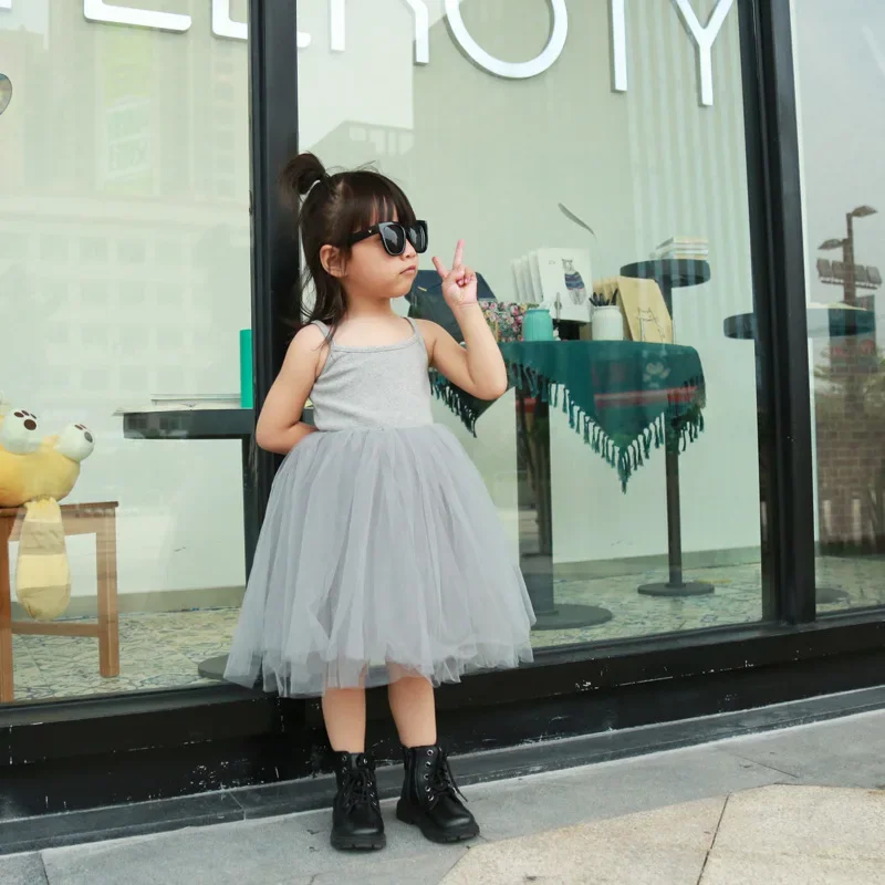 أطفال نسيج متماسكة رقيق بلون تول بسيط ولكن أنيق حالمة نمط الأطفال تنورة الفتيات رائعتين موضة فستان بلا أكمام