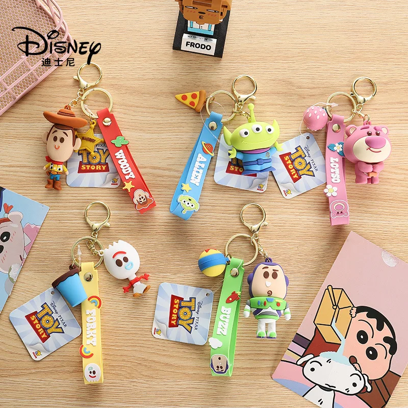 

Genuine cartoon strawberry bear keychain cute exquisite bass light-year glue keychain men and women bag pendant
