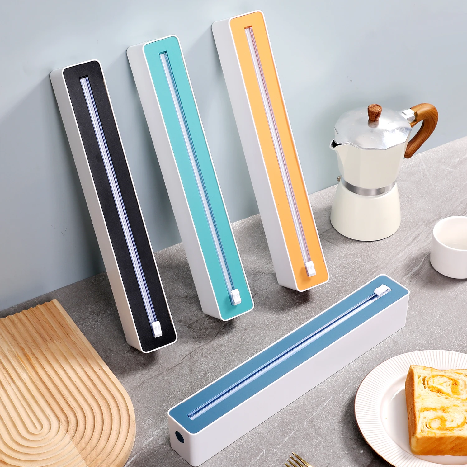 

Adjustable Plastic Wrap Cutter - Fits Most Standard Rolls, Ideal for Home & Kitchen