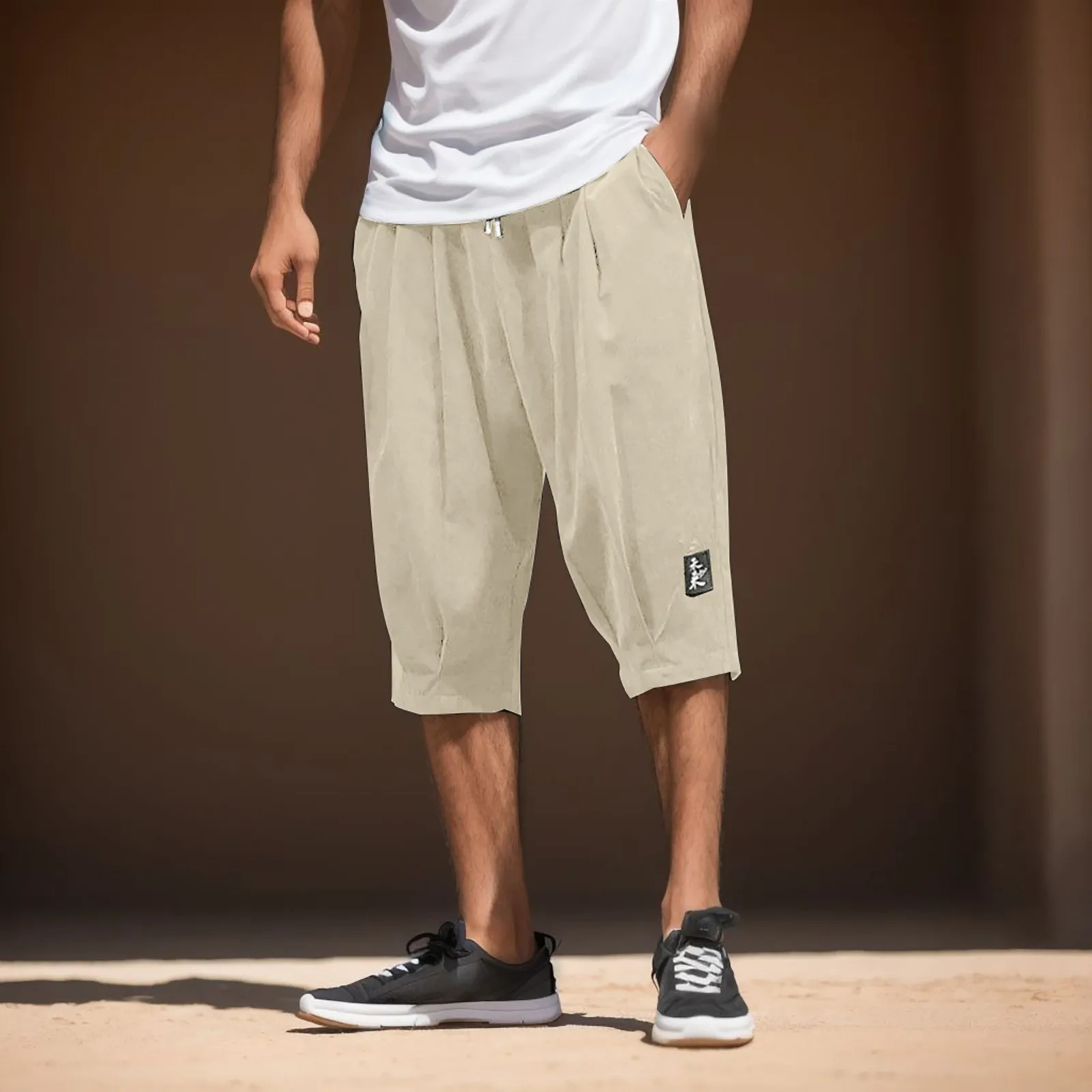 Pantaloncini Casual larghi estivi da uomo pantaloncini corti da uomo con ricamo traspirante a gamba dritta Plus Size pantaloncini da spiaggia